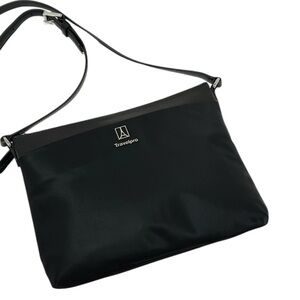 TRAVELPRO Crossbody Bag Black Pink rose interior Eiffel Tower emblem Like new